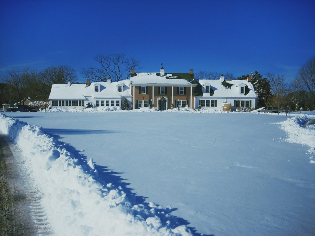 view of inn at huntingfield creek in winter